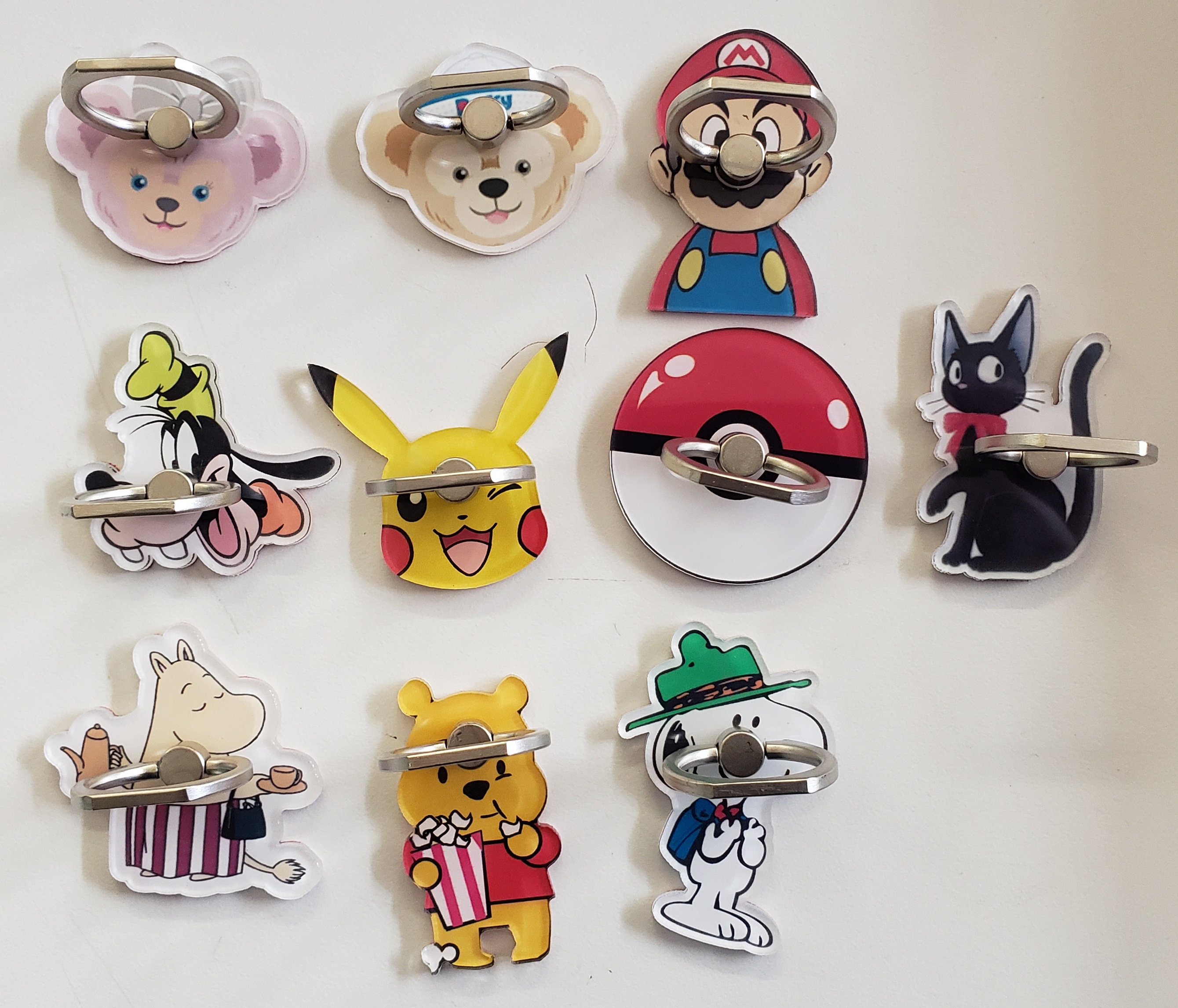 MISC: ASSORTED CHARACTER PHONE FINGER RING (NEW)